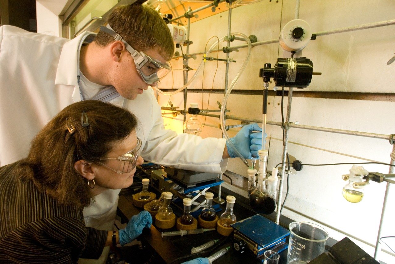 two students working in a macromolecular engineering lab